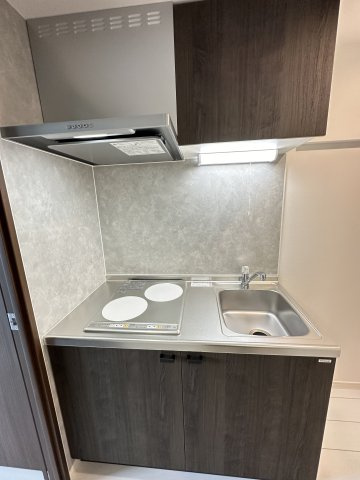 ベイルームY12のキッチン|コンパクトなキッチンで掃除もラクラク