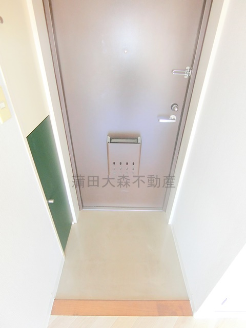 菱和パレス平和島の玄関
