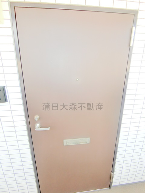 菱和パレス平和島の玄関