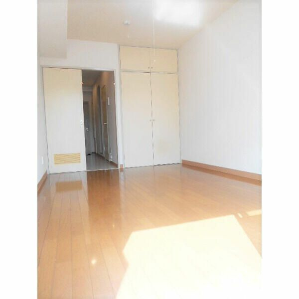 多摩市馬引沢２丁目の賃貸マンションの寝室