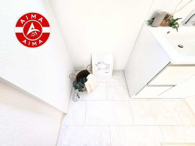 古賀市日吉2丁目第1-2棟（A号棟）の内観：施工例|ランドリースペースとなります。広々して有効的にご使用できます。 