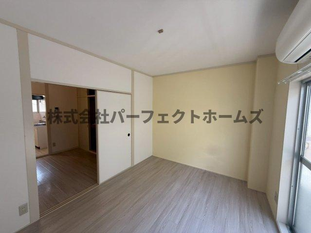 ブルースカイハイツ田井の洋室