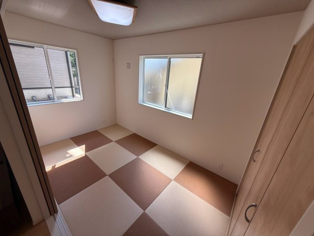ブルーミングガーデン／北区楡木4丁目／1号棟の前面道路含む現地写真
