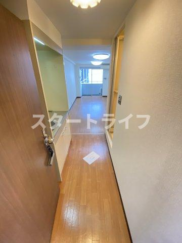 大阪市東淀川区西淡路１丁目の賃貸マンションの玄関