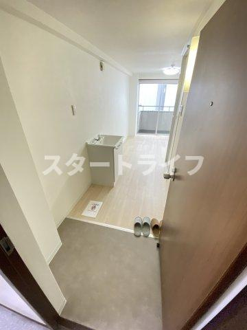 大阪市東淀川区西淡路１丁目の賃貸マンションの玄関