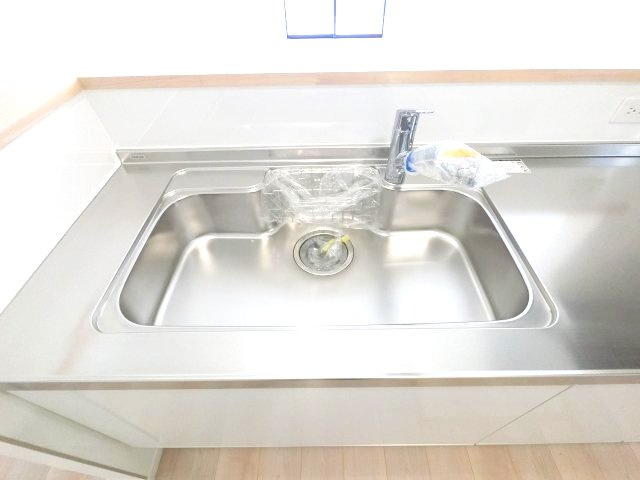 佐賀市北川副町光法第3 1号棟のキッチン|浄水機能付きの蛇口