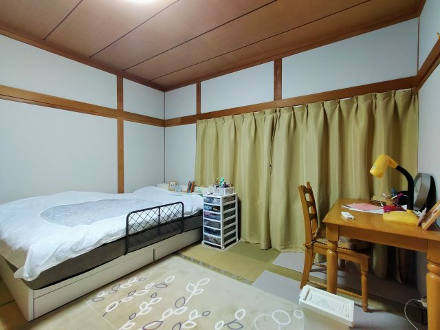 家庭菜園を楽しめる黒髪町戸建て　の寝室