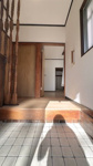 【玄関】 | 古賀市谷山中古戸建 | 【静寂の特等席】都会の喧騒を忘れ、深い眠りと安らぎを叶える家。