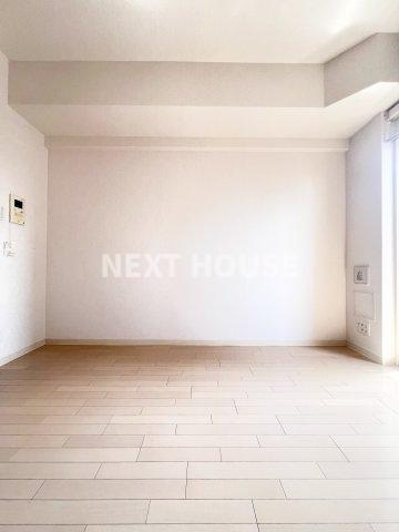 ライジングコート岸里玉出駅前の居間・リビング