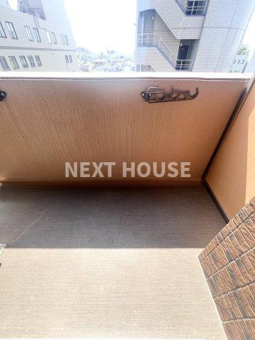 ライジングコート岸里玉出駅前のバルコニー