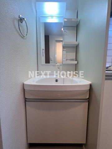 ライジングコート岸里玉出駅前の洗面所