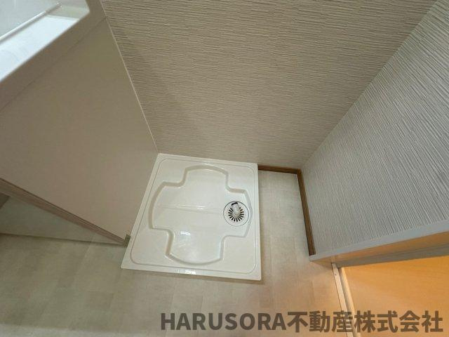 寝屋川市春日町　3階建のランドリースペース