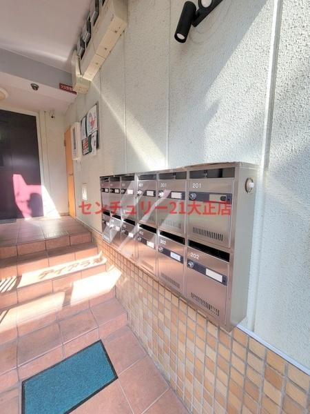 大阪市港区港晴３丁目の賃貸マンションのエントランス