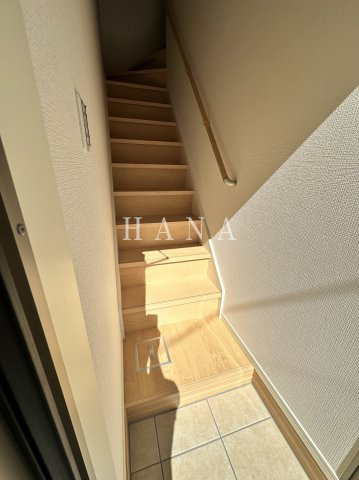津川サンライト足立の玄関