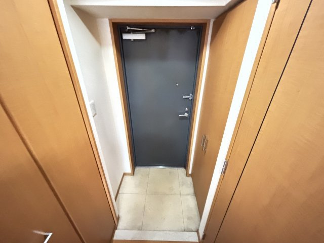 オーキッドレジデンス塚本の玄関