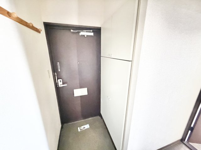 ホーリーグランド稲毛山王の玄関