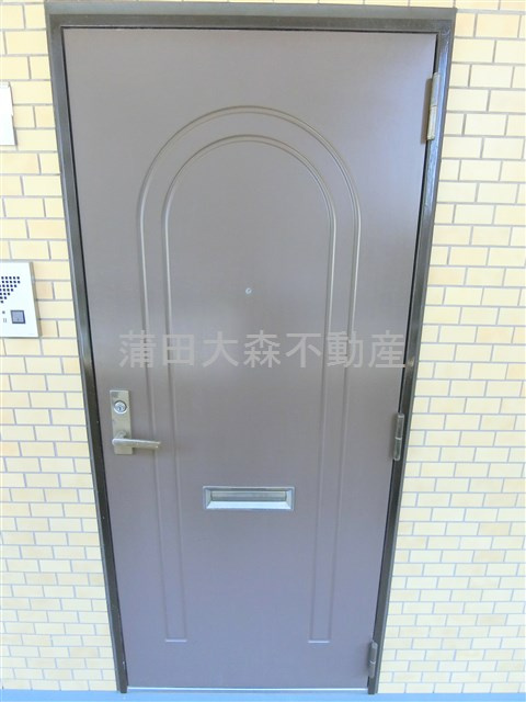 多摩リバビューマンションの玄関