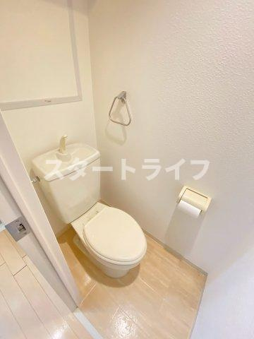 大阪市東淀川区西淡路２丁目の賃貸マンションのトイレ