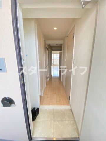 大阪市東淀川区西淡路２丁目の賃貸マンションの玄関