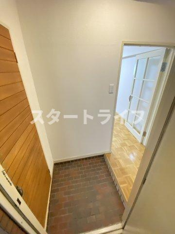 大阪市淀川区東三国２丁目の賃貸マンションの玄関