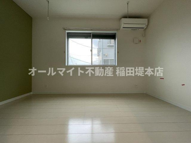 川崎市麻生区高石３丁目のアパートの寝室