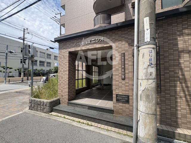 パールヒルズニシオ　苅田小学校区のエントランス|パールヒルズニシオ　エントランス