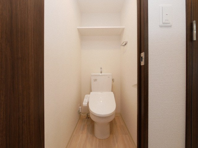 大阪市西区九条南２丁目の賃貸マンションのトイレ