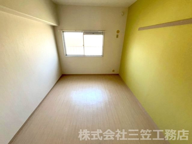 寝屋川市中神田町の賃貸マンションの寝室