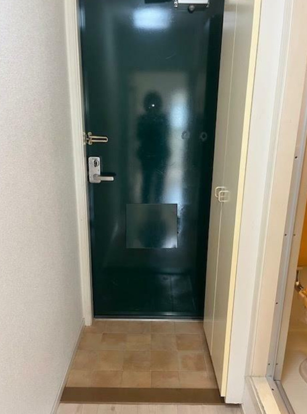 ジョイパレス新在家の玄関