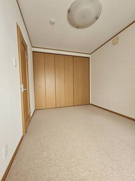 下中村４丁目貸家の寝室