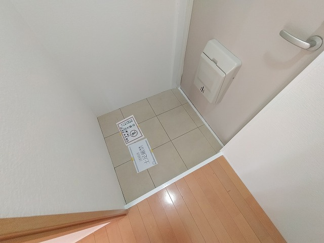 神戸市長田区西山町３丁目の賃貸マンションの玄関