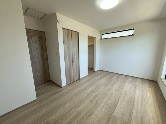 南城市佐敷新開1番　B号棟の洋室