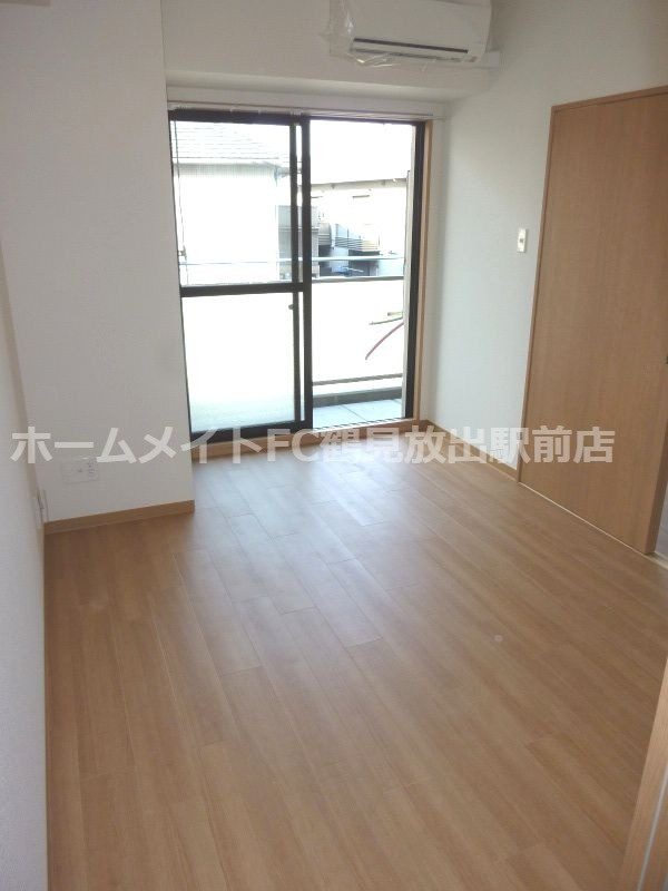 大阪市鶴見区放出東３丁目の賃貸マンションの洋室