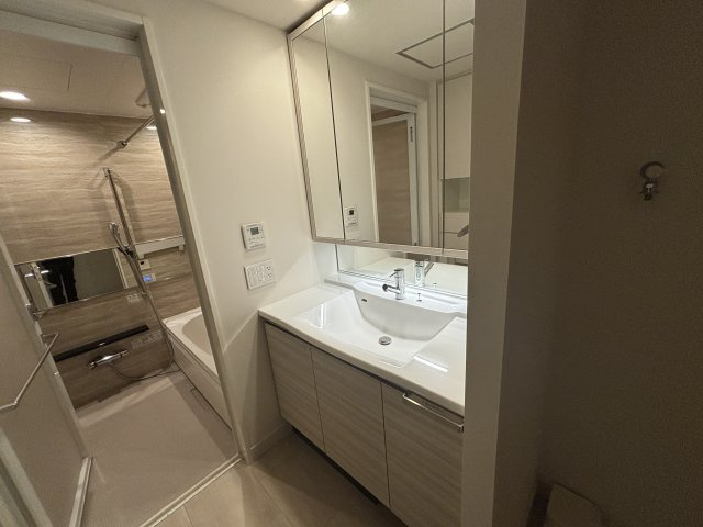 グランドメゾン新梅田タワー THE CLUB RESIDENCEの洗面所