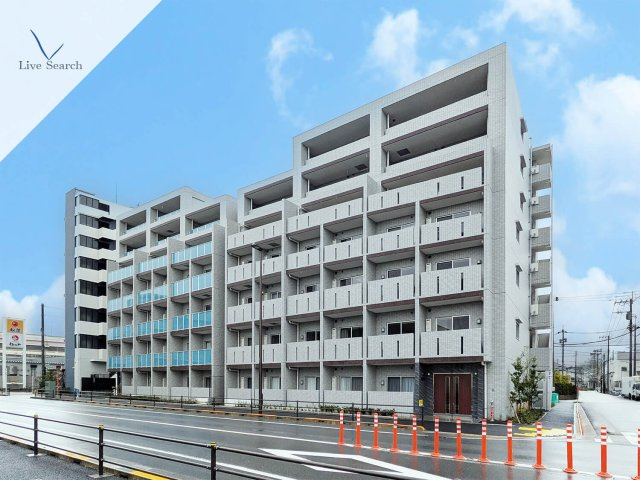 ペアパレス六町環七北通りの外観