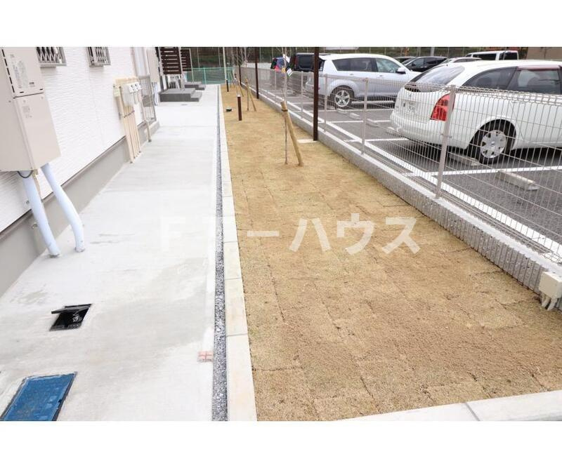 サンライズ飯山満の駐車場