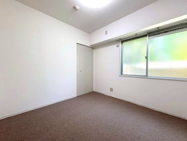 グランパス富田林の寝室