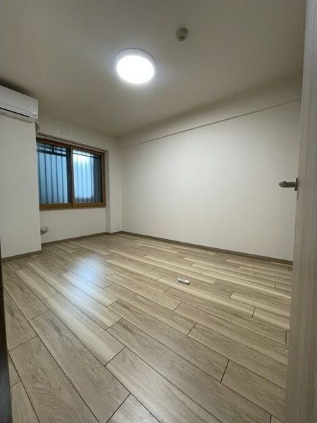 西区新町アーバンコンフォートの寝室