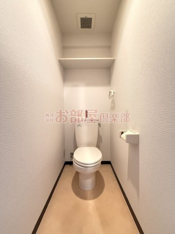 ＱＭ壱番館のトイレ|落ち着いた色調のトイレです