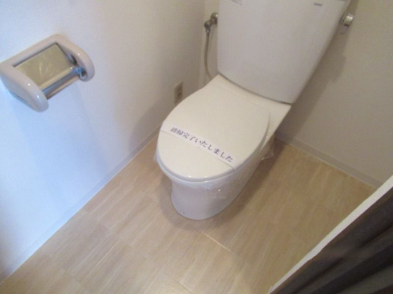 コスモ南柏のトイレ|落ち着いた色調のトイレです