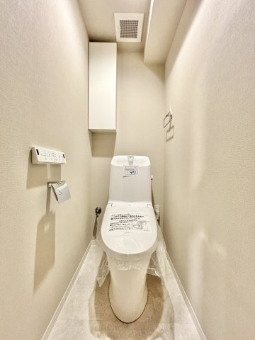 ダイヤシャトー千里のトイレ|落ち着いた色調のトイレです