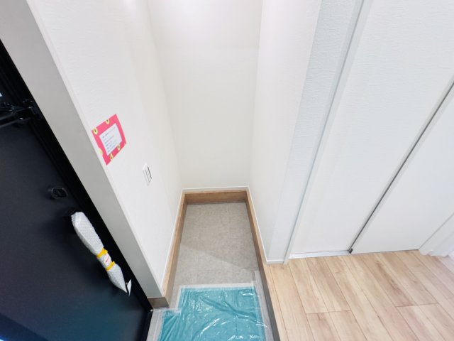 柏市柏の葉２丁目新築戸建（柏の葉12期）の玄関|玄関ホール横・土間収納スペース