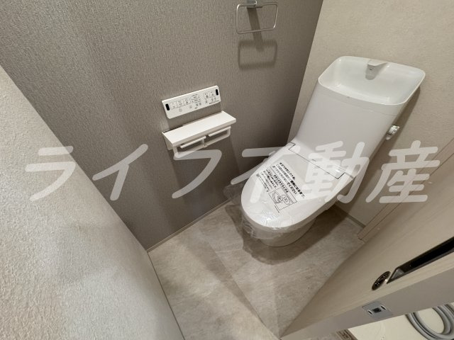Grace下六万寺町のトイレ|落ち着いた色調のトイレです