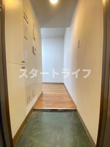 大阪市淀川区十三東３丁目の賃貸マンションの玄関