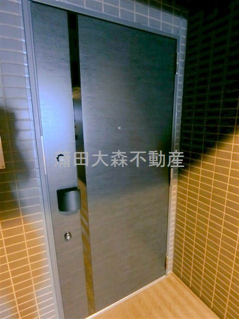 アクサス大森西アジールコートの玄関