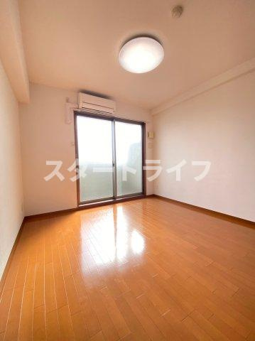 大阪市淀川区木川東２丁目の賃貸マンションの居間・リビング