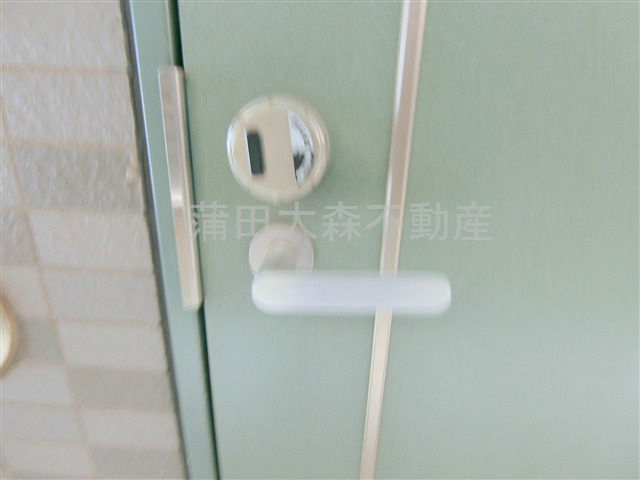 第45シンエイビルの玄関