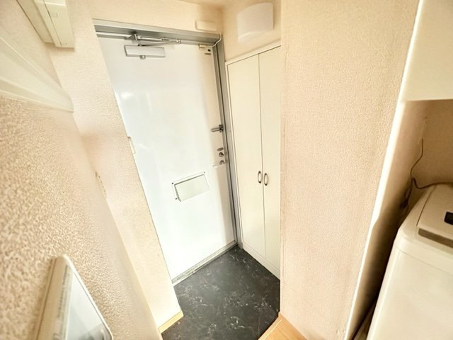 レオパレスウイング北坂戸の玄関