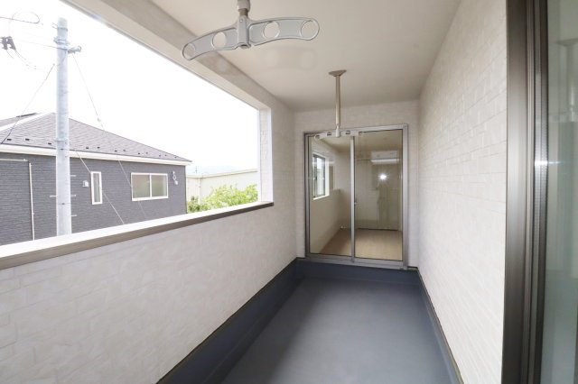 郡山市富田町字町内　　　　2号棟　　　富田小学校、富田中学区のバルコニー