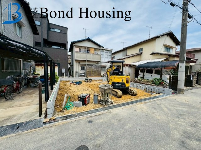 大型商業施設まで徒歩圏で生活便利　二見町西二見第16　新築戸建の前面道路含む現地写真